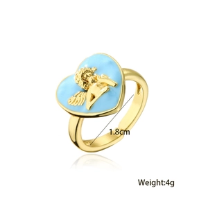 Detail of 18K gold plated ring with light blue enamel heart and angel relief design