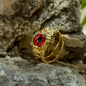 Vintage bohemian 18K gold plated copper ring featuring a red dragon eye on rock background