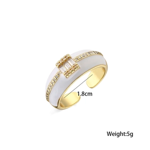 Detail view of 18K gold plated ring showing 1.8cm diameter and rectangle zircon gems