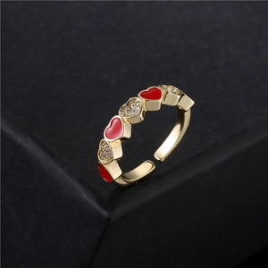 Bague ouverte dorée ajustable avec cœurs en émail rouge et pierres de zircon brillant