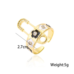 Detail view of gold flower ring with enamel drip and zircon, size 2.7cm, weight 5g