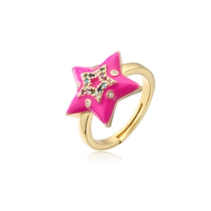 Detail of pink enamel star ring with multicolored zircon stones and golden finish