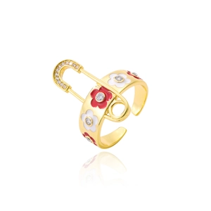 Detail of gold-plated safety pin ring with red and white enamel flowers and zircon crystals