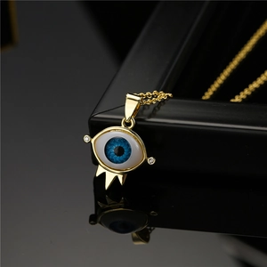 Elegant 18K gold plated evil eye pendant necklace with blue iris and crystal accents
