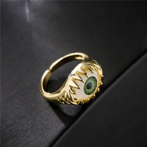 Adjustable 18K gold plated copper evil eye ring with green pupil and claw design