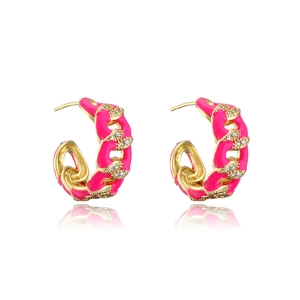 Close-up of gold chain link earrings with pink enamel coating and sparkling zircons