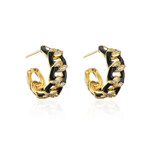 Detail of C-shaped gold-plated hoop earrings with black enamel and micro-pave cubic zirconia