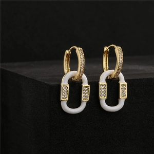 Elegant 18K gold plated drop earrings with white ceramic oval and pavé zircon details