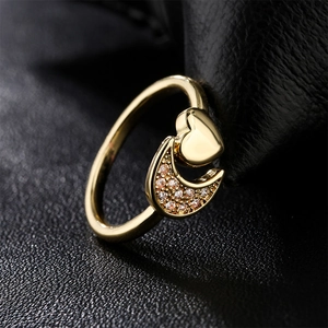 Elegant gold open ring featuring a crescent moon with white zircon and small heart design
