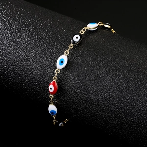 Gold-plated colorful Evil Eye bracelet with blue, red and black enamel beads