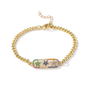 Bracelet chaîne cubaine dorée avec plaque rectangulaire et zircons colorés en étoile