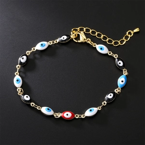 Gold-plated colorful Evil Eye bead bracelet with adjustable chain on black background