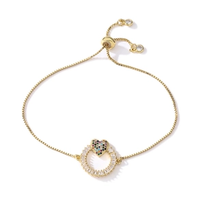 Bracelet ajustable doré avec motif cœur et zircons cubiques étincelants
