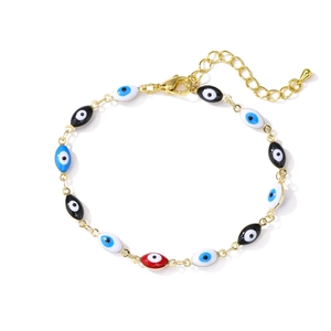 Detail of gold-plated evil eye bracelet with colorful enamel charms and adjustable chain