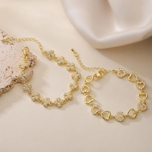 Luxus 18K Vergoldetes Kupfer Armband Mit Funkelnden Zirkonia Herz Kleeblatt Anhängern Für Damen Party Hochzeit Mode Schmuck