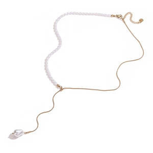 Elegant asymmetrical gold necklace featuring white pearls and a baroque pearl drop pendant