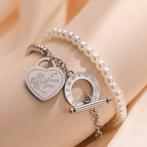 Double-layer pearl bracelet with 18K gold heart pendant and roman numeral OT buckle