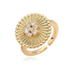 Adjustable 18K gold plated flower ring with woven texture and central zircon stones