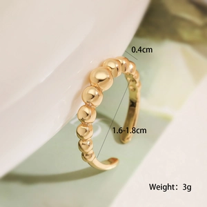 Macro view of 18K gold plated beaded open ring with dimensions 1.6-1.8cm diameter