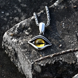 Vintage stainless steel evil eye pendant necklace with amber eyeball and woven chain