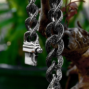 Men's vintage stainless steel Celtic knot chain bracelet with mechanical clasp and aged silver finish