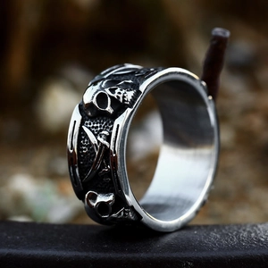 Gothic stainless steel ring with skull and crossed scythes relief in vintage silver finish