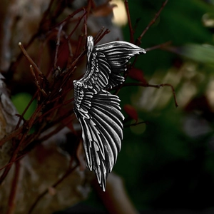 Vintage stainless steel angel wing pendant necklace with detailed feather texture and dark finish