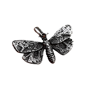 Vintage stainless steel moth pendant with antique silver finish and gothic wing details
