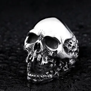 Gothic punk style skull ring in silver stainless steel with vintage distressed texture