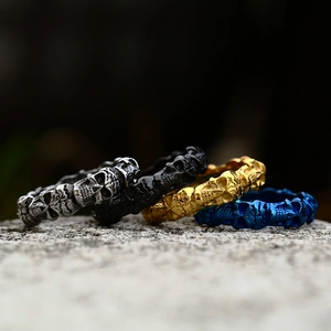 Vintage gothic skull rings set in silver, black, gold and blue stainless steel for men
