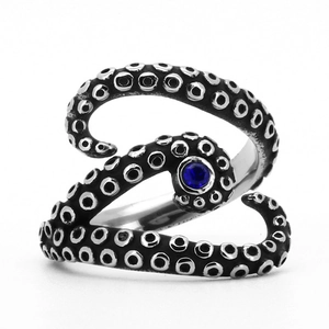 Vintage octopus stainless steel adjustable ring with a polished round blue gemstone