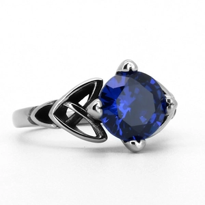 Vintage stainless steel ring with deep blue round gemstone and Celtic knot patterns