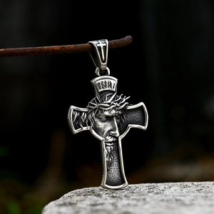Vintage stainless steel crucifix pendant with detailed Jesus portrait and INRI engraving