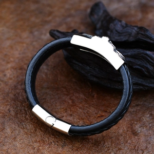 Vintage braided black leather bracelet for men with silver stainless steel skull element