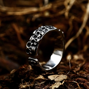 Vintage punk stainless steel skull relief open ring with a distressed black finish for men
