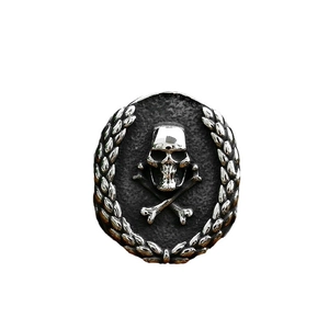 Gothic skull and crossbones stainless steel ring with embossed laurel wreath and black texture