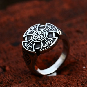 Vintage Viking Celtic knot signet ring in antique steel finish for men on rustic base