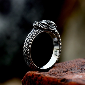 Vintage stainless steel dragon ouroboros ring with antique finish and scaled texture