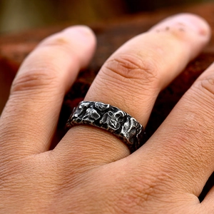 Macro shot of Viking style ring featuring vintage lava texture and oxidized silver finish