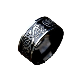 Vintage stainless steel ring with black Celtic dragon pattern and silver polished edges