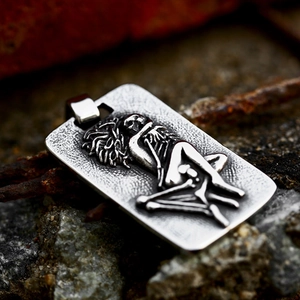 Retro stainless steel rectangular pendant with a vintage skull figure embossed relief