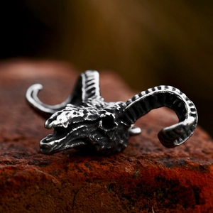 Vintage stainless steel ram skull pendant with oxidized finish and detailed horn texture