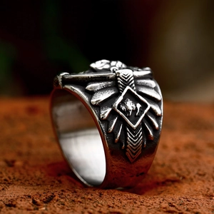 Vintage stainless steel native buffalo ring with detailed wing engraving and silver finish