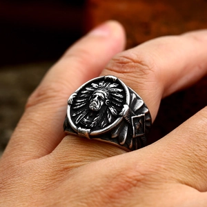 Macro shot of vintage silver stainless steel ring featuring a detailed Indian chief relief