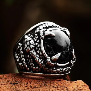 Vintage stainless steel snake ring featuring a black stone and eagle claw design