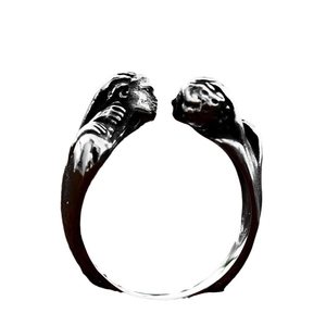 Vintage Edelstahlring mit künstlerischem Doppelgesichtsrelief und offenem Design