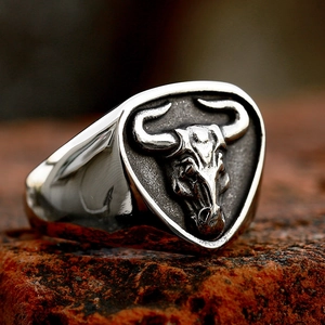 Retro stainless steel men's signet ring featuring a detailed bull head relief design