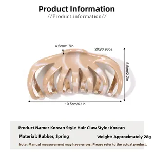 Detailed view of large brown marble hair claw clip showing 10.5cm size and 28g weight