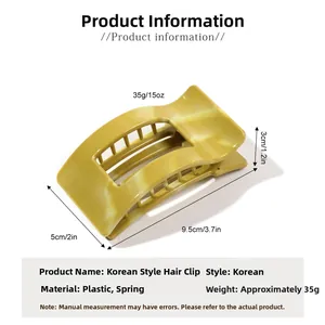 Detailed view of mustard yellow marble pattern hair claw clip with 9.5cm length dimensions