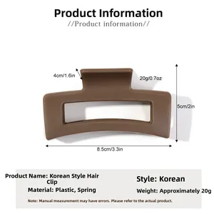 Detailed view of an 8.5cm matte brown rectangular hair claw clip with size measurements